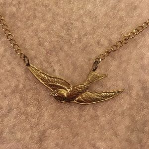 Gold bird necklace